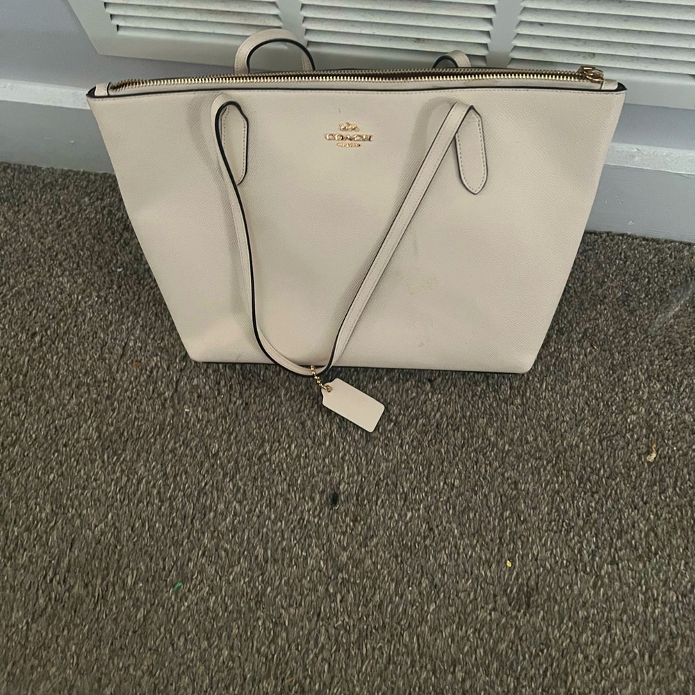 White Coach handbag, all leather. Only carried once or twice.